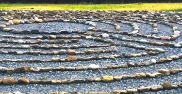 stones in labrynth formation on a gravel area