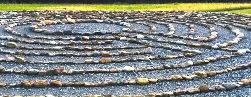 stones in labrynth formation on a gravel area
