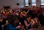 Christmas Eve candles in worship