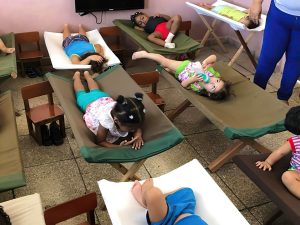 children on cots