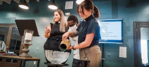 pastors pouring water for baptism