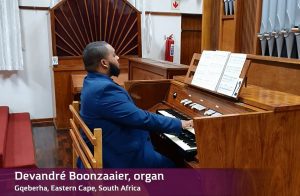 man playing organ