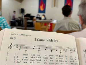 image of hymnal in worship