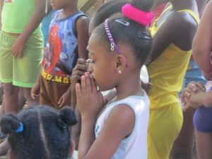 Young girl praying